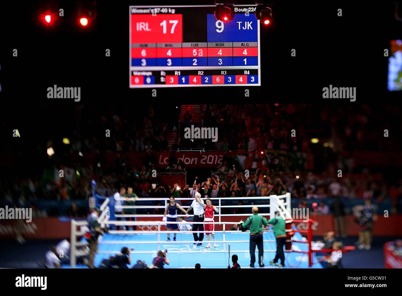 Ireland's Katie Taylor celebrates her win against Tajikistan's Mavzuna Chorieva during their Women's Boxing Light (60kg) Semi Final bout at the ExCel centre, London, on the twelfth day of the London 2012 Olympics. Stock Photo