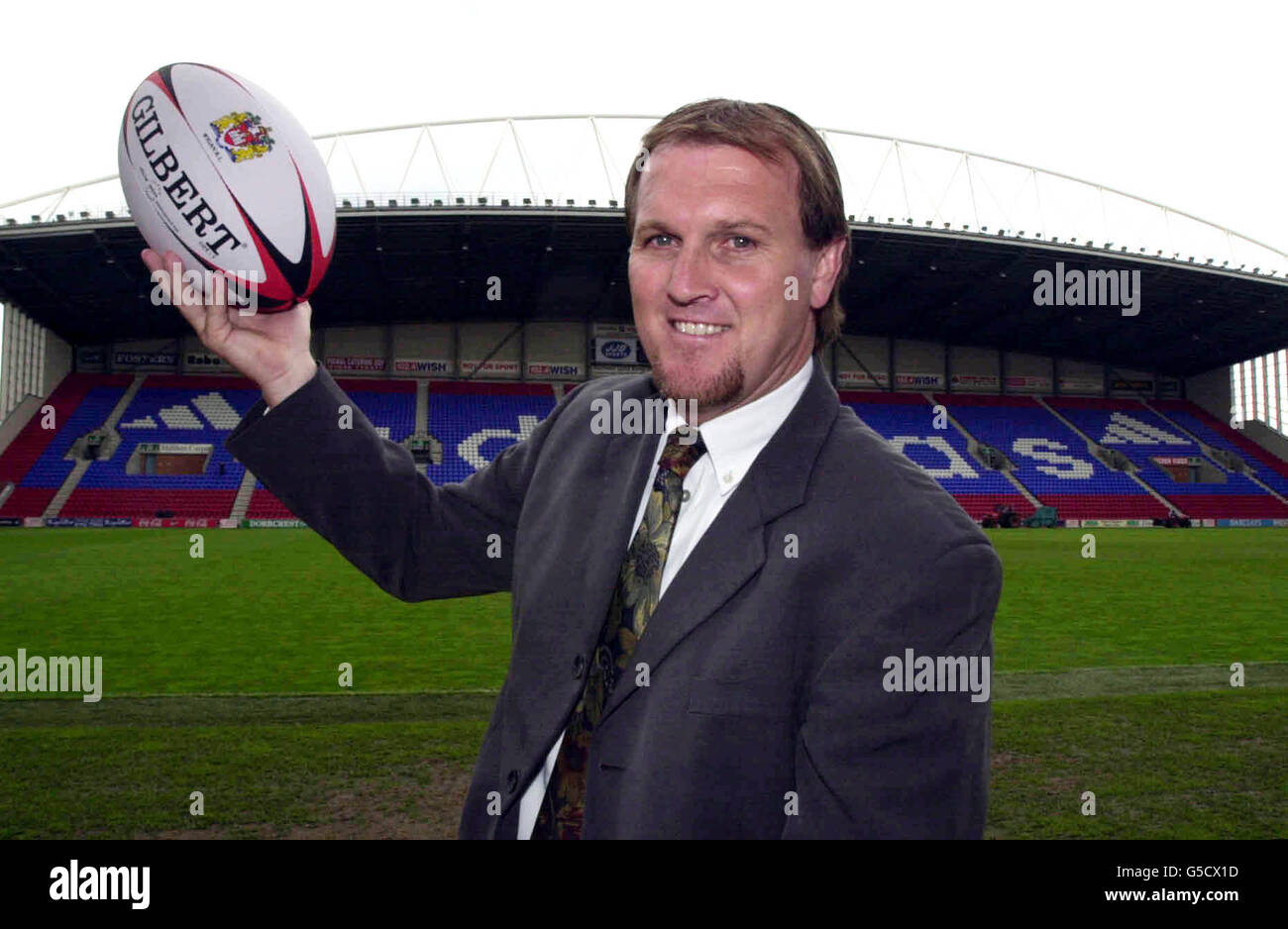Wigan's new coach Stuart Raper poses for photographers at the JJB