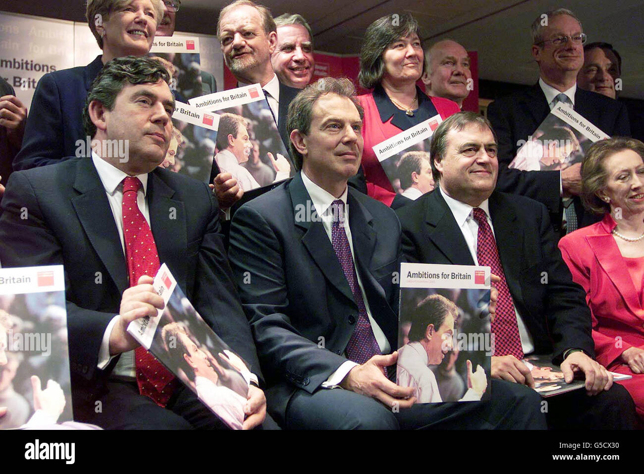 Britain's Prime Minister Tony Blair (centre) with rest of the Cabinet at the launch of the Labour party's manifesto in Birmingham. Under the heading Ambitions for Britain - which is the title of the manifesto - * Mr Blair said Labour's intention was to sustain economic stability and build deeper prosperity that reaches every region of the country. Stock Photo