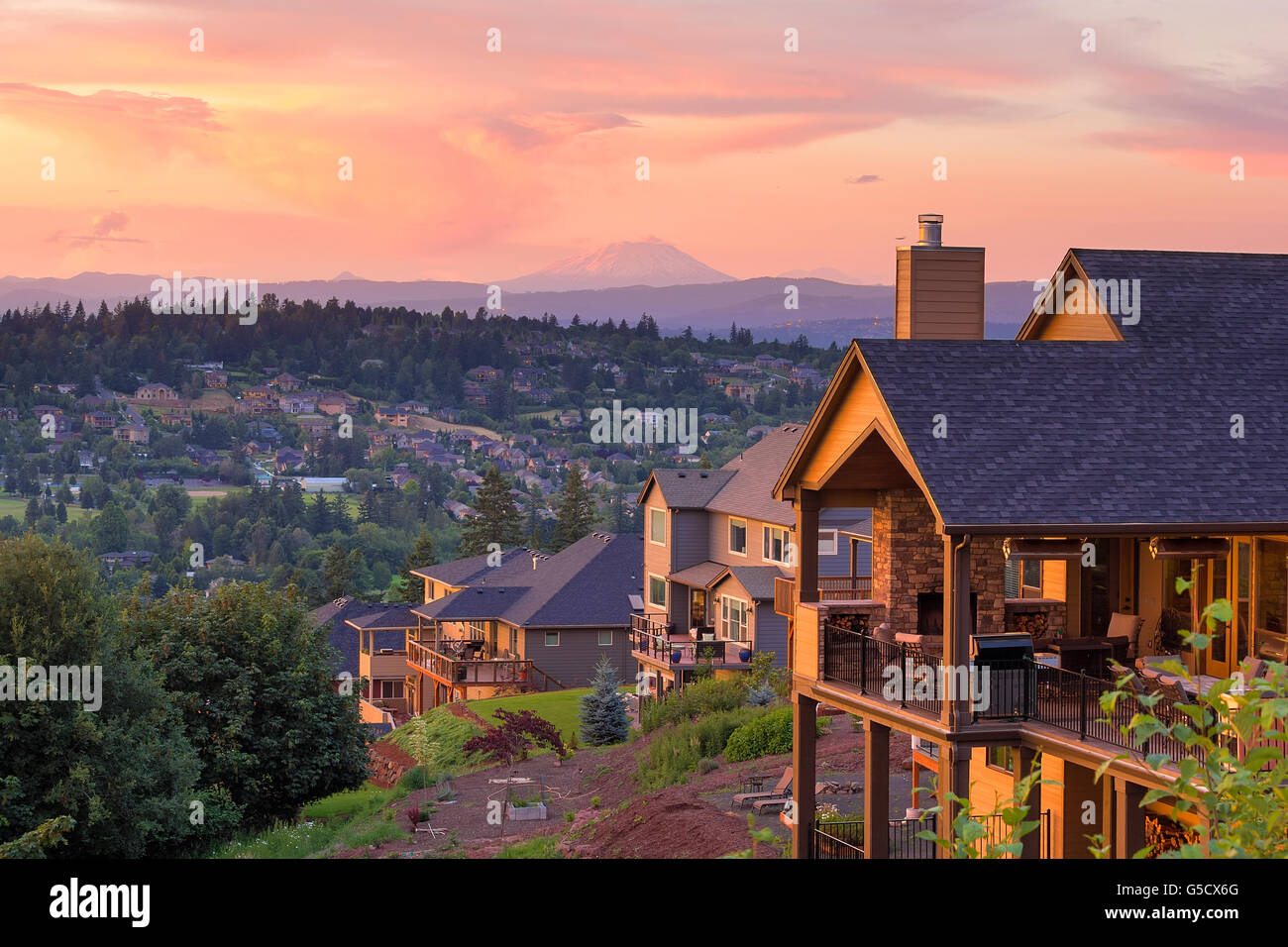 Sunset View with Mount St Helens from deck of luxury homes in Happy Valley Oregon in Clackamas County Stock Photo