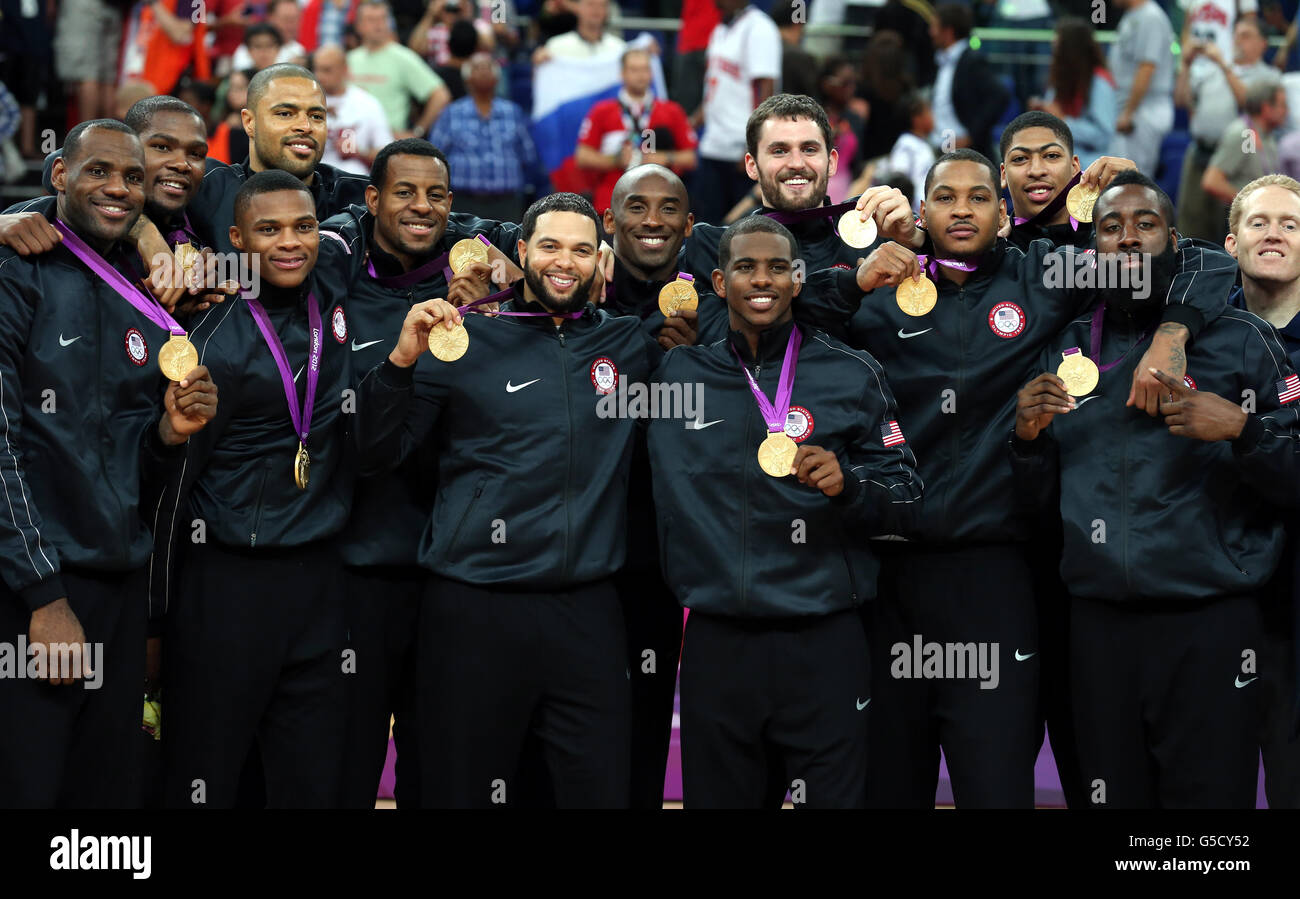 USA team celebrates following their victory over Spain in the men's basketball final on sixteen of the Olympic Games at the North Greenwich Arena, London. Stock Photo