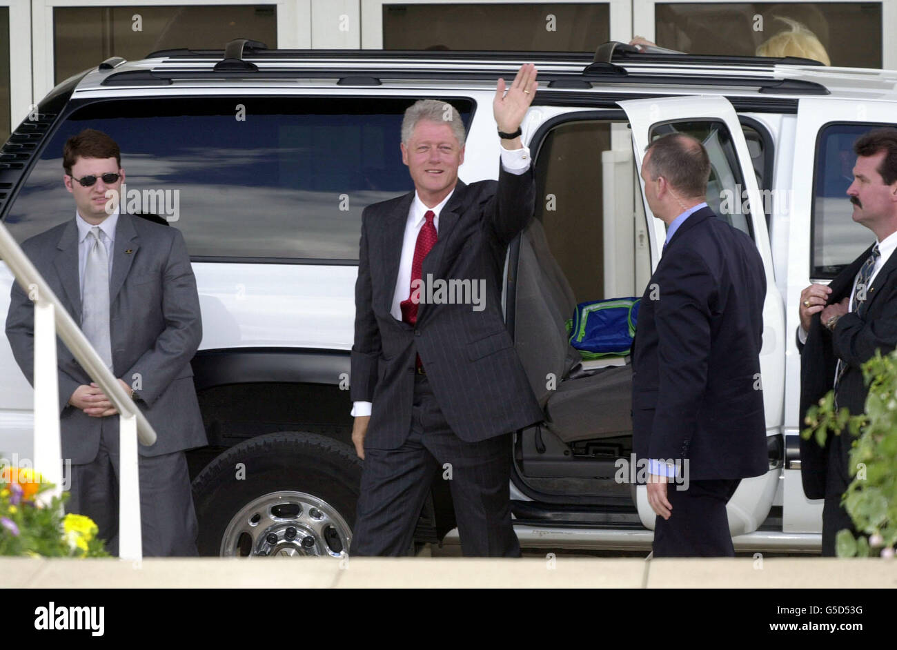 Waving 3 4 three quarter length car bill clinton hires stock