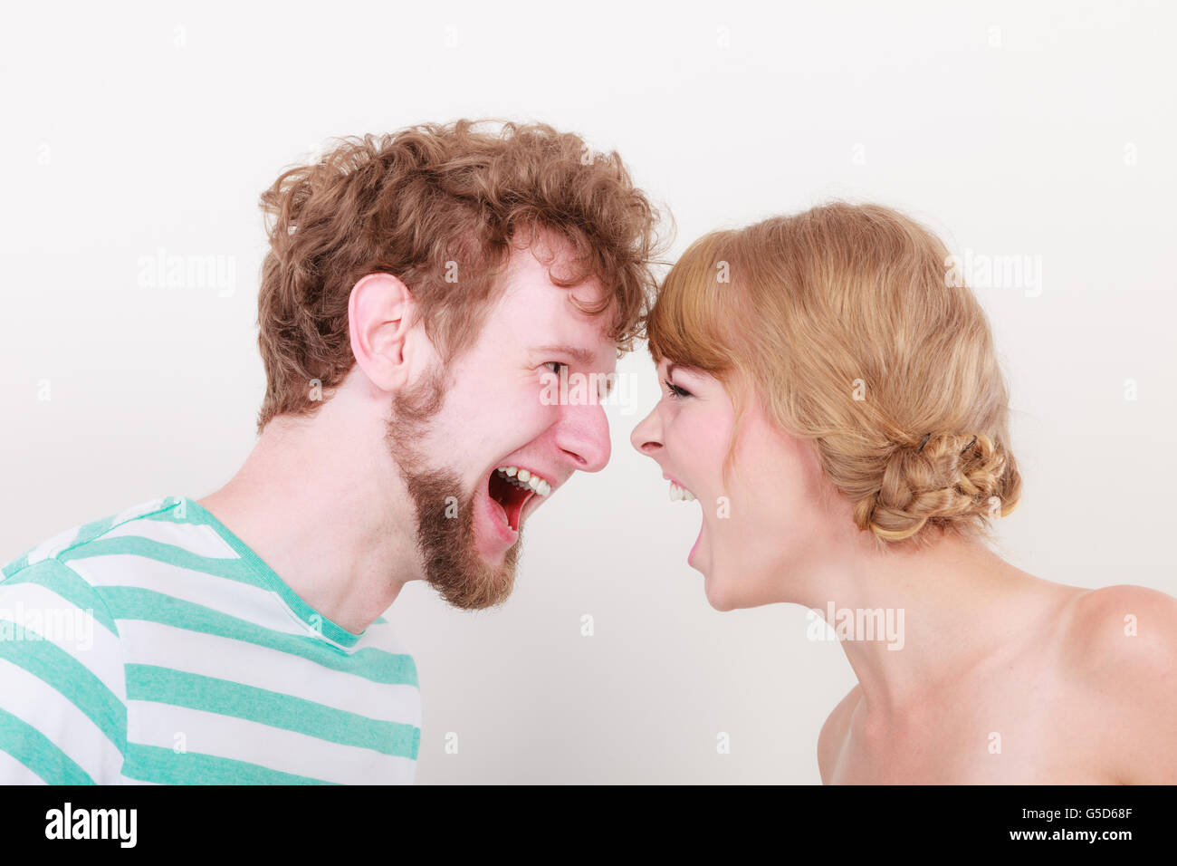 relationship difficulties. Angry woman and man yelling at each other ...