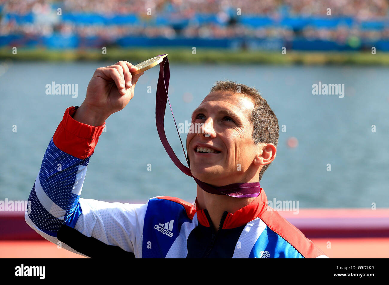 Great Britain's Ed McKeever celebrates winning gold in the final of the