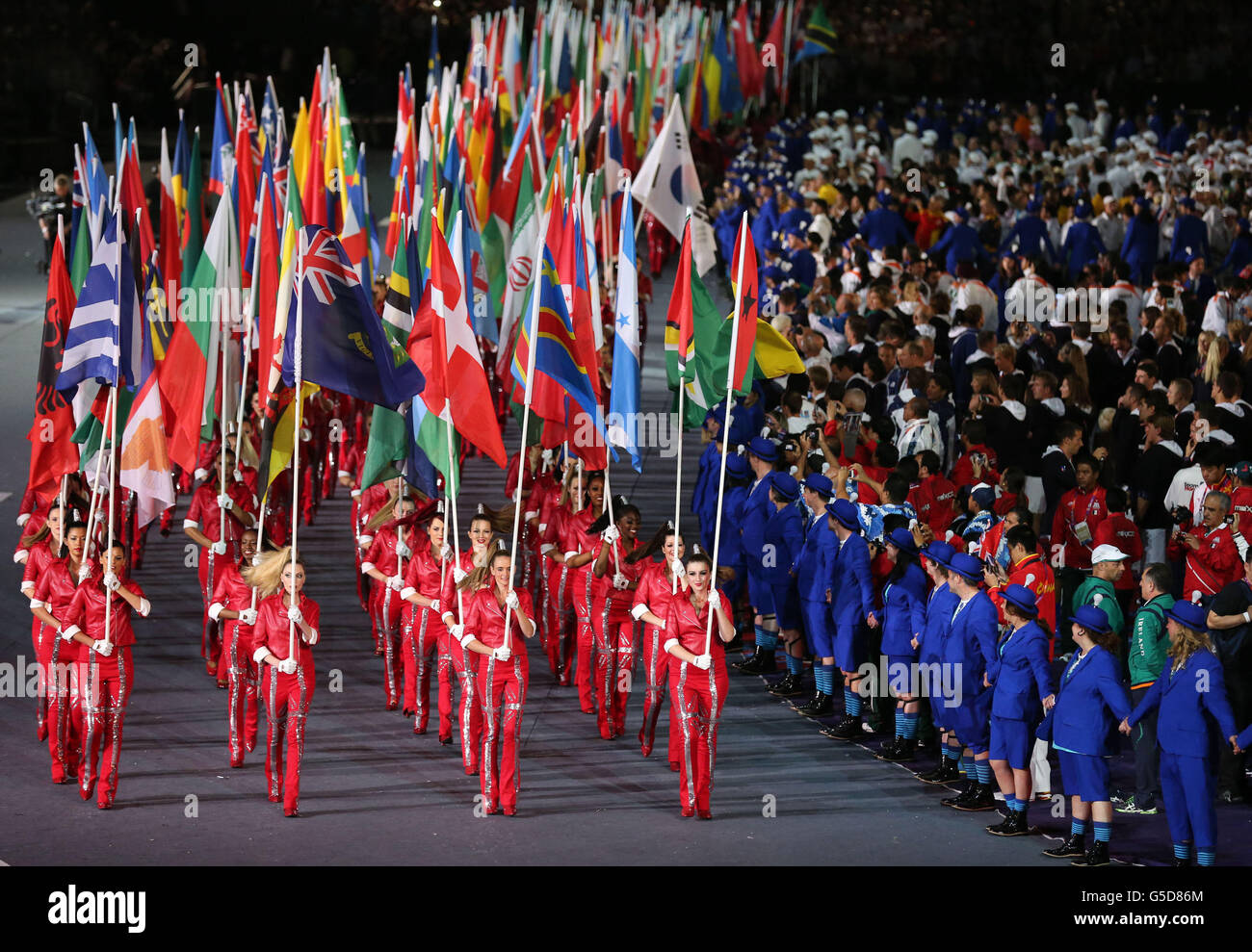 Flags are brought out during the Olympic Games Closing Ceremony at the ...