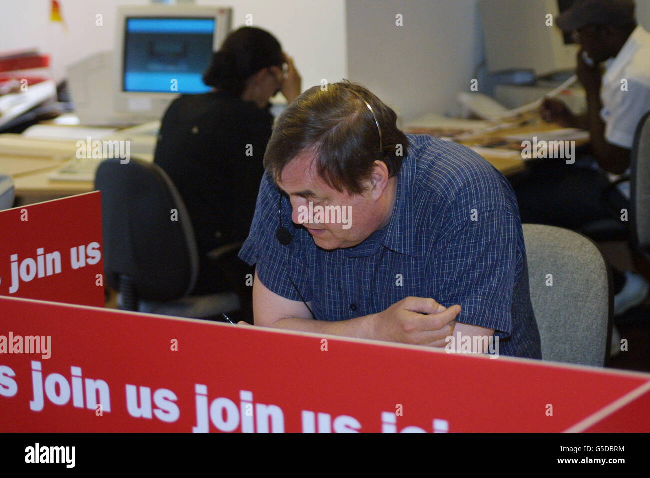 Deputy Prime Minister John Prescott taking part in a public phone-in regarding Labour's latest election broadcast, which was screened on national television, at Labour Party headquarters at Millbank Tower, in London. Stock Photo