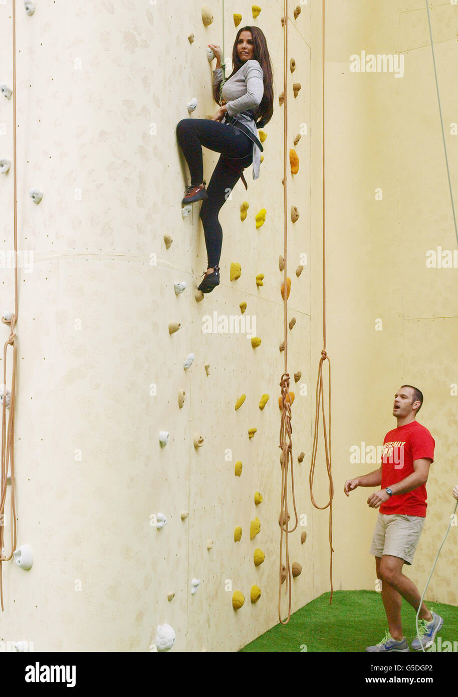 Katie Price climbing the 22m high Walkers Deep Ridged Crisp wall at ...