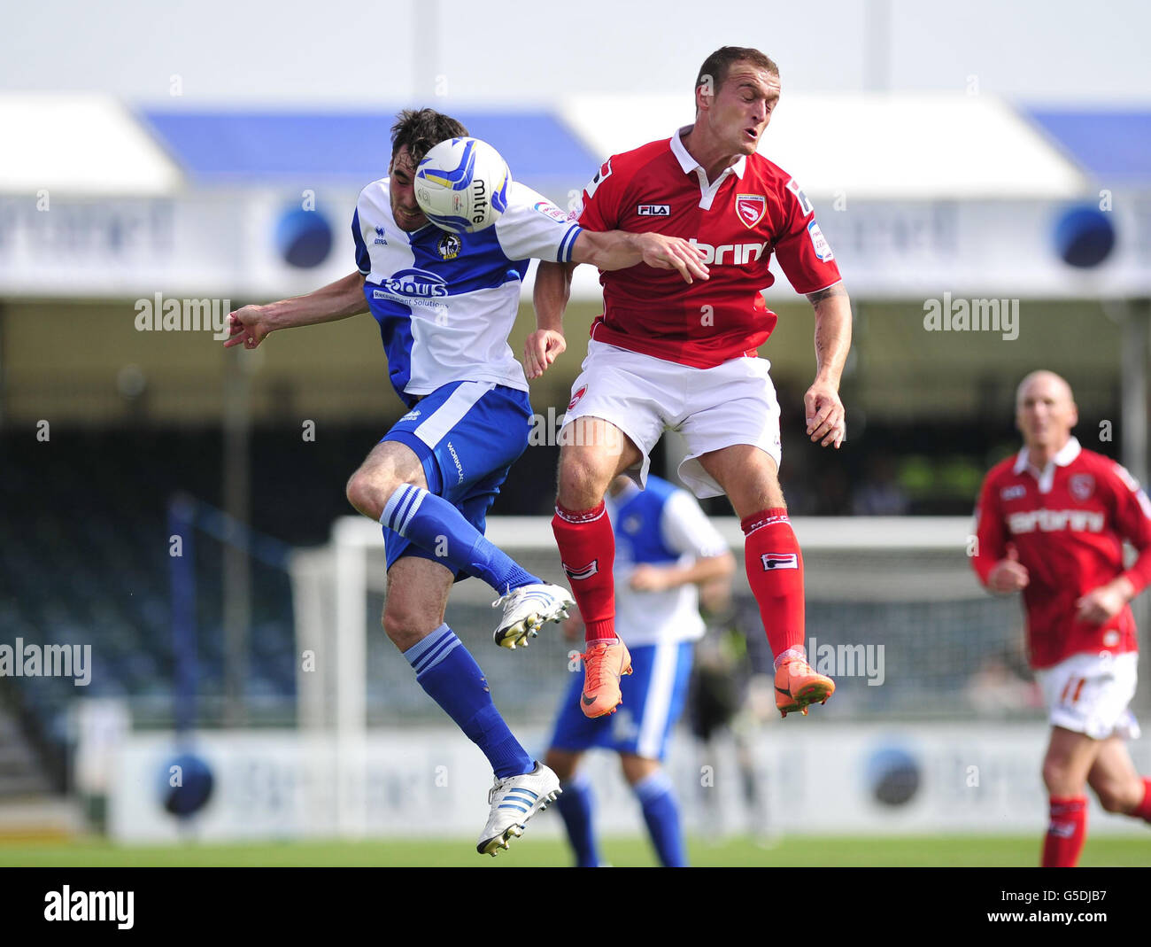 Bristol Rovers Michael Smith and Morecambe's Lewis Alessanra in action during the npower Football League Two match at the Memorial Stadium, Bristol. Stock Photo
