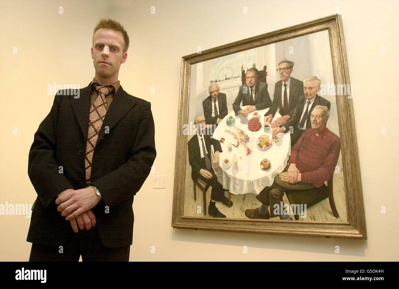 Winner of the BP Portrait Award 2001 Stuart Pearson Wright, with his painting 'The Six Presidents of the British Academy' at the National Portrait Gallery in central London 2001. * Stuart won 25,000 and a 3,000 commission to paint a portrait for the gallery's contemporary collection. Stock Photo