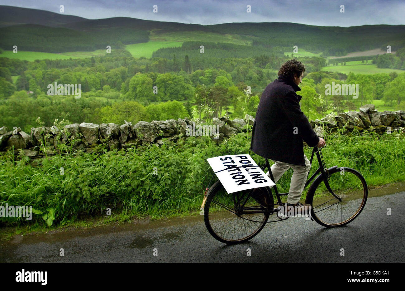 An early voter sets off near Peebles in the Scottish Borders to set up ...