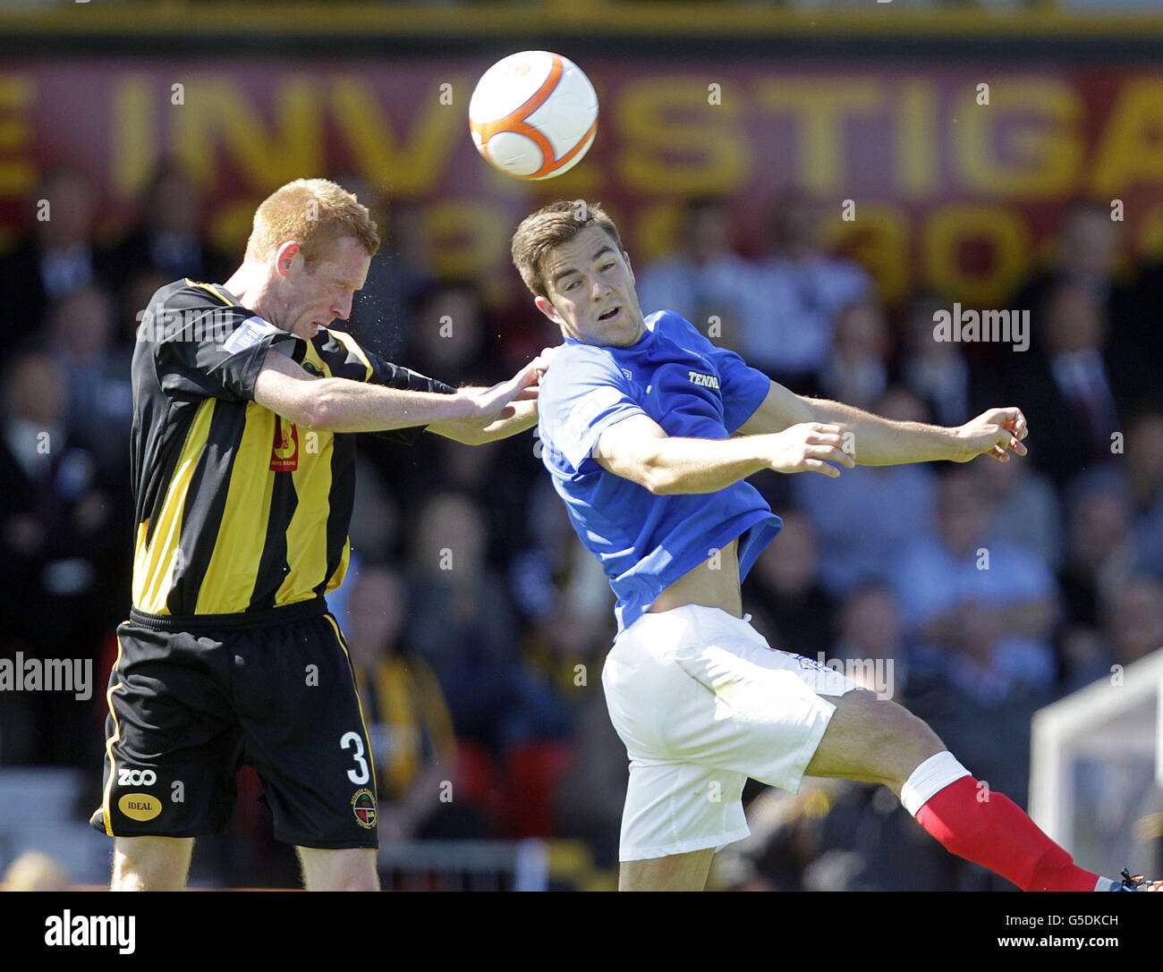Berwick Rangers' Dean Hoskins (left) battles with Rangers' Andrew ...