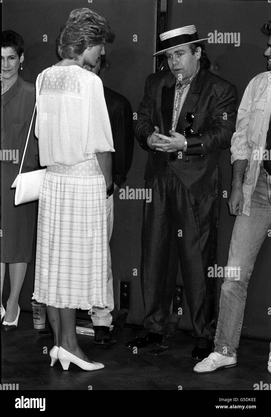 1985: The Princess of Wales opened the massive Live Aid concert in aid of the African famine at Wembley Stadium, London. She is pictured here with Elton John, one of the many artistes appearing in the transatlantic event. Stock Photo