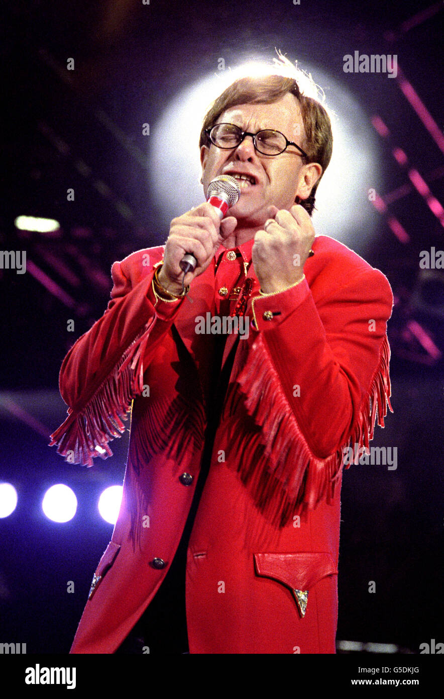 Singer and pianist Elton John performing during the Freddie Mercury Tribute Concert at Wembley, London. Stock Photo