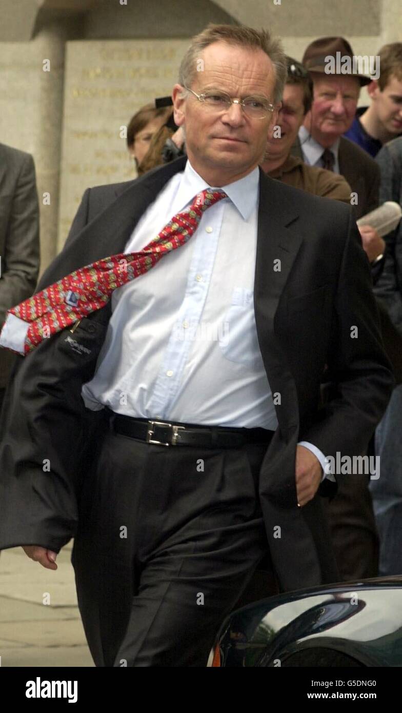Walking red tie court trial jeffrey archer archgal hi-res stock
