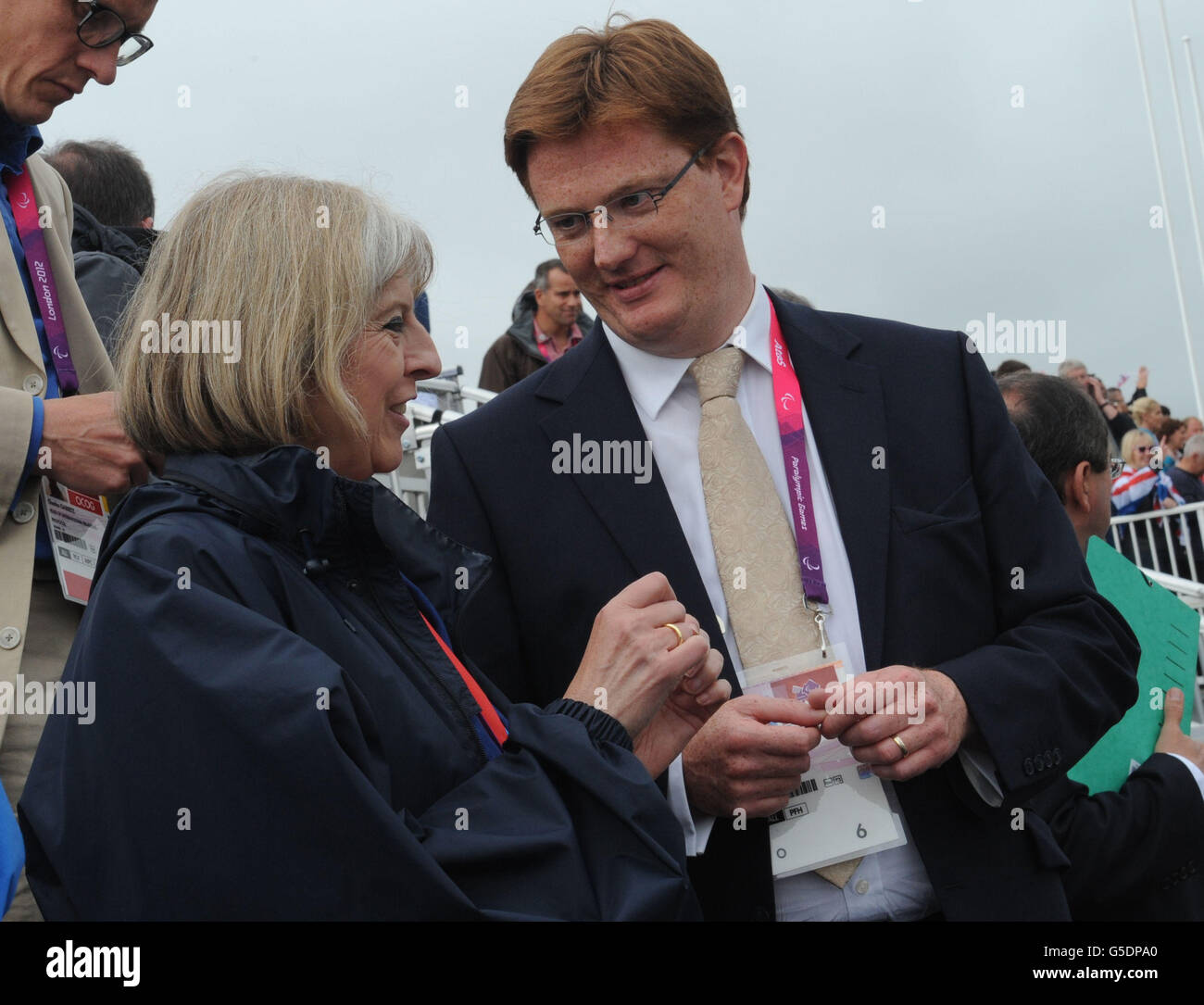 Home Secretary Theresa May talks with Chief Secretary to the Treasury Danny Alexander (right) during the rowing finals at Eton Dorney in Berkshire during the Paralympic Games. Stock Photo