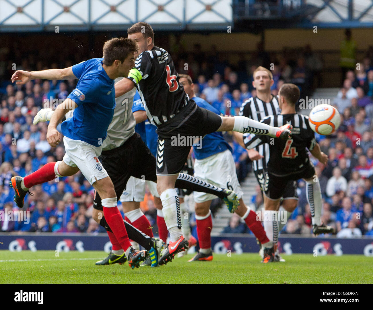 Rangers' Andrew Little hits the post with a header during the Irn-Bru ...