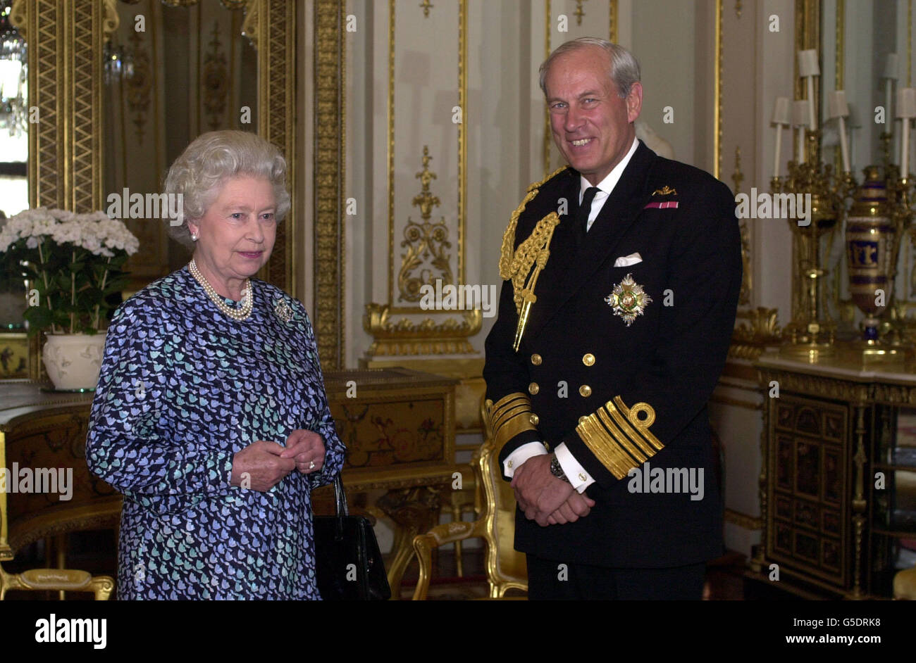 Britain's Queen Elizabeth II receiving Admiral Sir Michael Boyce on assumng the appointment of the Chief of the Defence Staff, at Buckingham Palace, London. Stock Photo