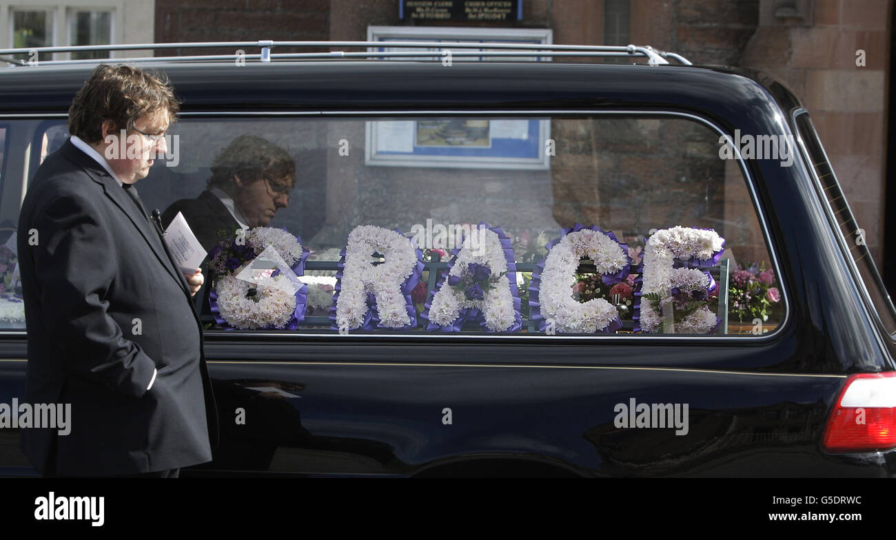 The scene, including the floral tributes, following the funeral of five