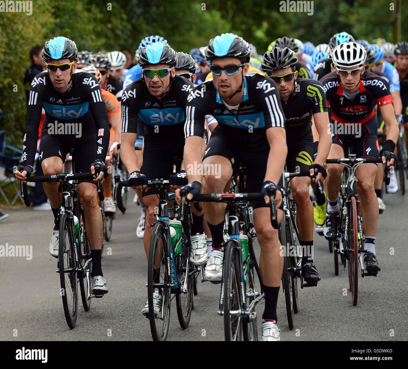 Bradley Wiggins (left) with the rest of the Sky Team as they chase a breakaway group on the climb of Alstonfield in the Peak District during stage two of the Tour of Britain, from Nottingham to Knowsley. Stock Photo