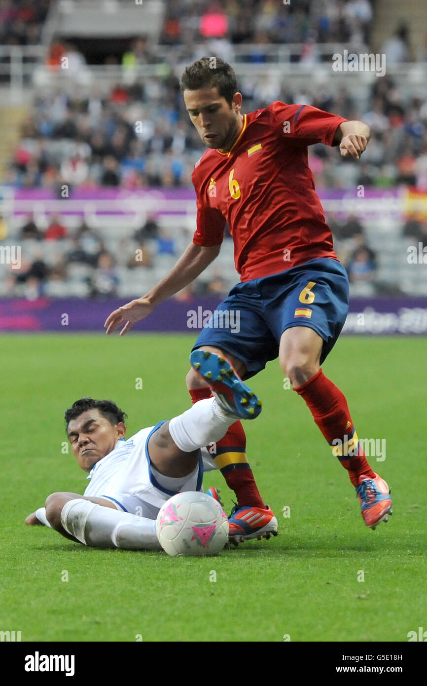 Spain's Jordi Alba (r) tackles Honduras' Mario Martinez Stock Photo