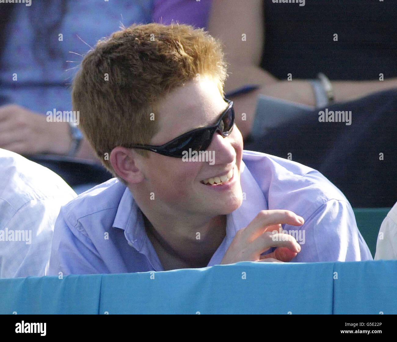 Prince Harry in the grandstand at Cowdray Park, Sussex, for the Hurlingham Polo Association Coronation Cup. Stock Photo