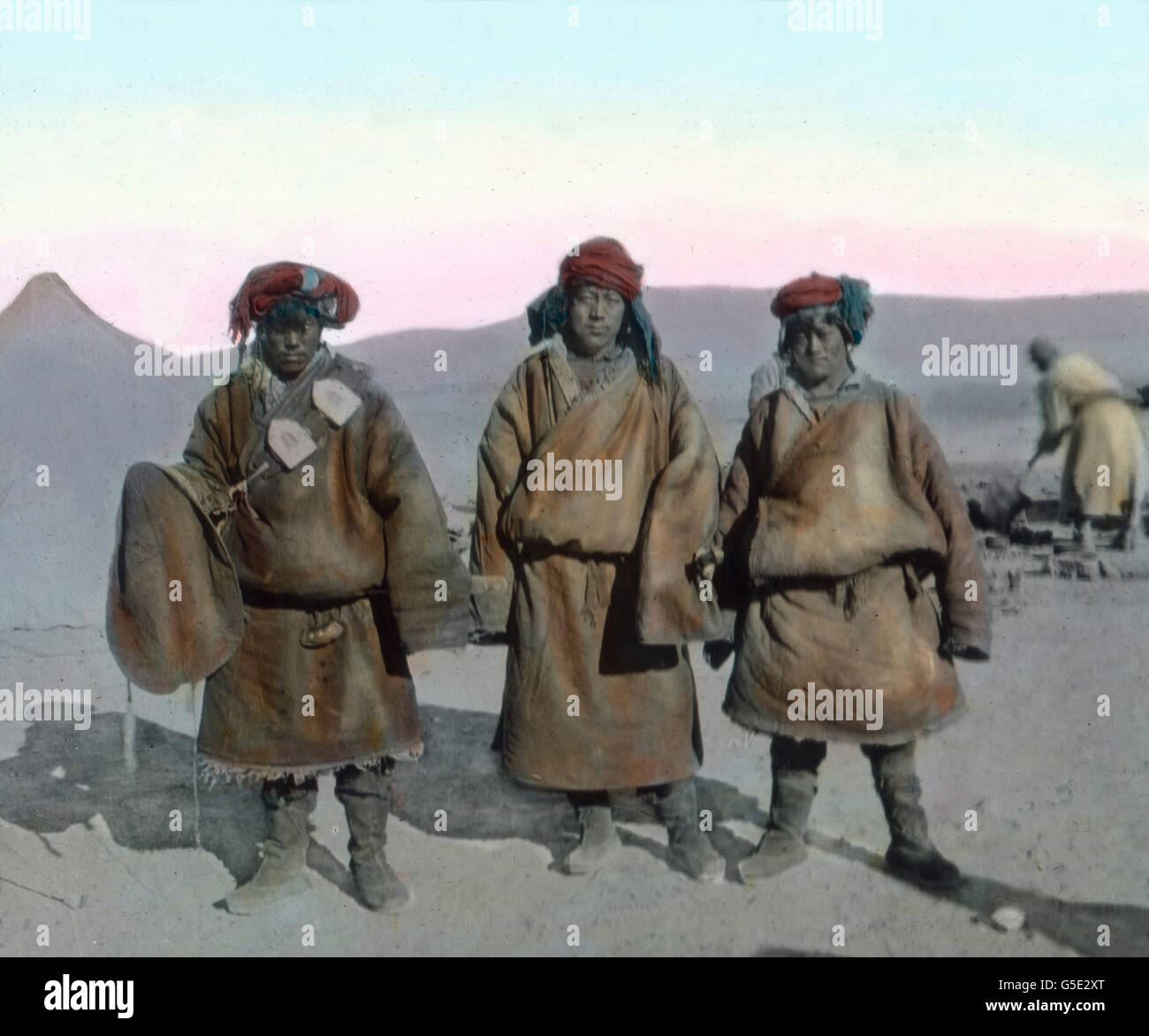 Die Post ist da. The mail messengers have reached the expedition camp. travel, history, historical, 1910s, 20th century, archive, Carl Simon, hand coloured glass slide, men, native, mail, postman, messenger, message, communication, camp, mountains, Asia, Asian, native, Tibet Stock Photo