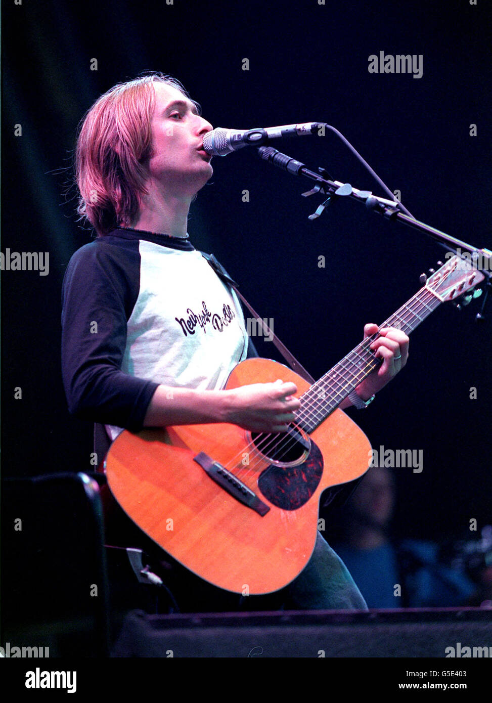 Divine Comedy lead Singer Neil Hannon performing on stage at the V2001 concert in Hylands Park, Chelmsford, Essex. Stock Photo