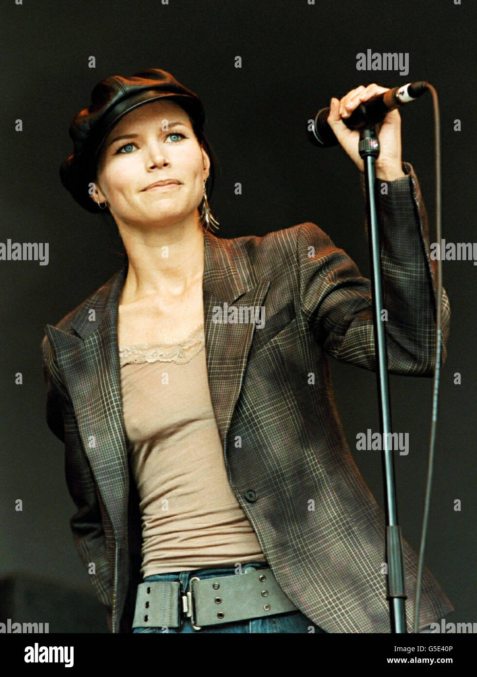 Singer Nina Persson, of The Cardigans, performing with her new group 'A  Camp', at the V2001 concert in Hylands Park, Chelmsford, Essex. Acts such  as rock outfit Red Hot Chili Peppers, Texas,