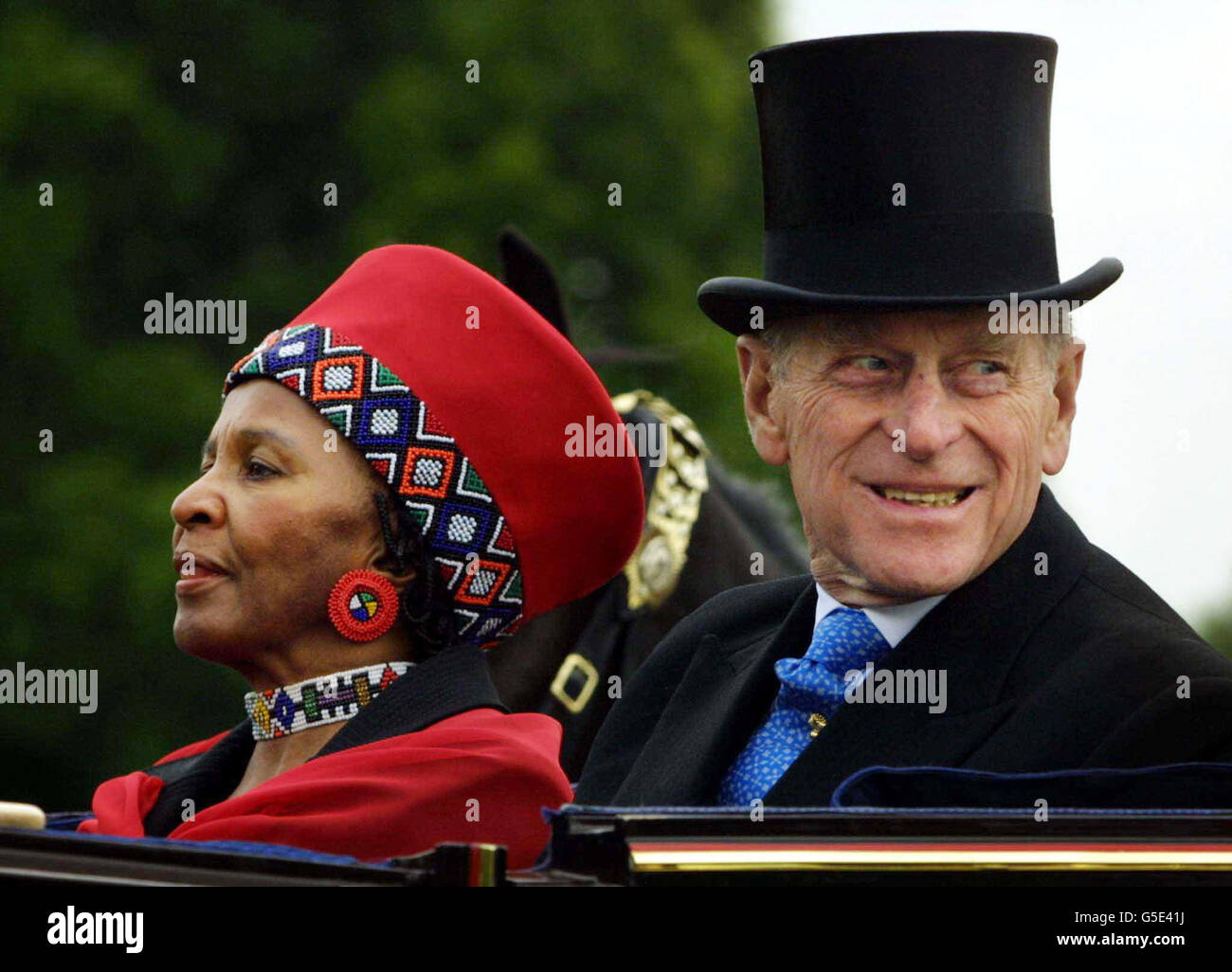 Britain's Duke of Edinburgh, husband of Queen Elizabeth II, arrives at Windsor Castle accompanied by Zanelli Mbeki, wife of Thabo Mbeki, President of the South African Republic. Mbeki is in Britain for an official State Visit until June 15. Stock Photo