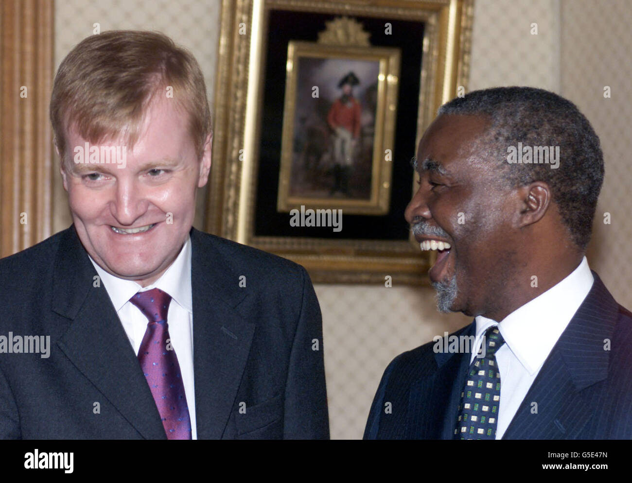 Leader of the British Liberal Democrat Party Mr Charles Kennedy (L) meets the South African President in a sitting room at Windsor Castle, Berkshire, during the State Visit to Britain of the President of the Republic of South Africa Thabo Mbeki. * ... and Mrs Mbeki. President Mbeki is on four day trip which will include visits to London and Scotland where he will address the Scottish Assembly. Stock Photo