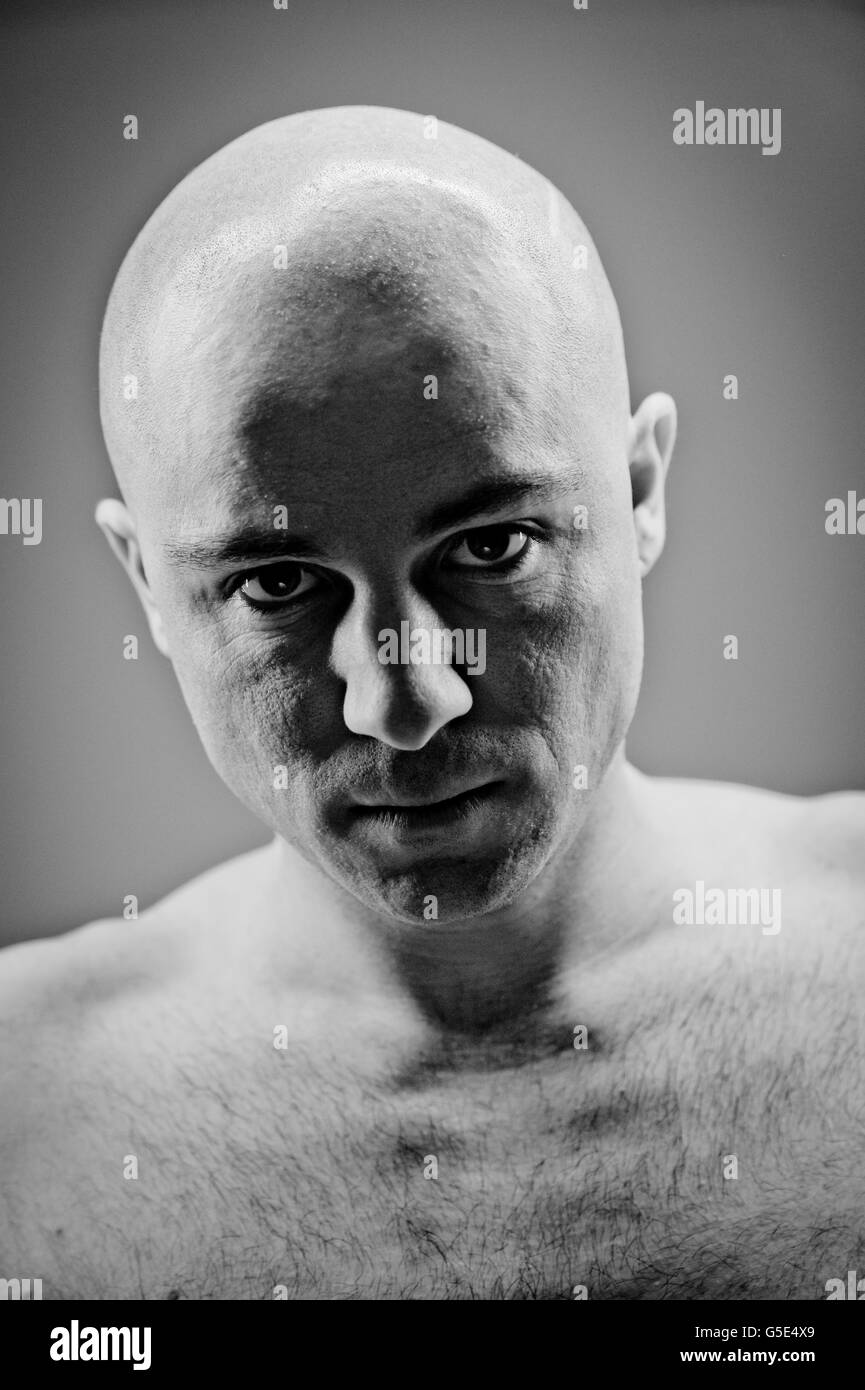 Young man with a bald head, portrait Stock Photo