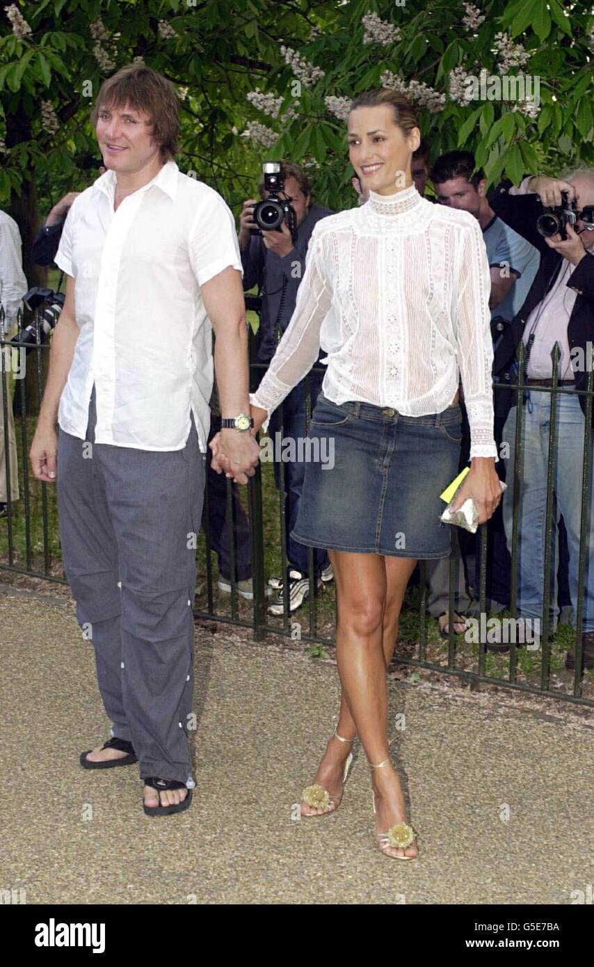 Duran Duran singer Simon Le Bon with his model wife Yasmin arrive at the Serpentine Gallery Summer Party in central London. The annual fund-raiser for the leading contemporary art gallery is held in the pavilion on the Gallery Lawn. Stock Photo