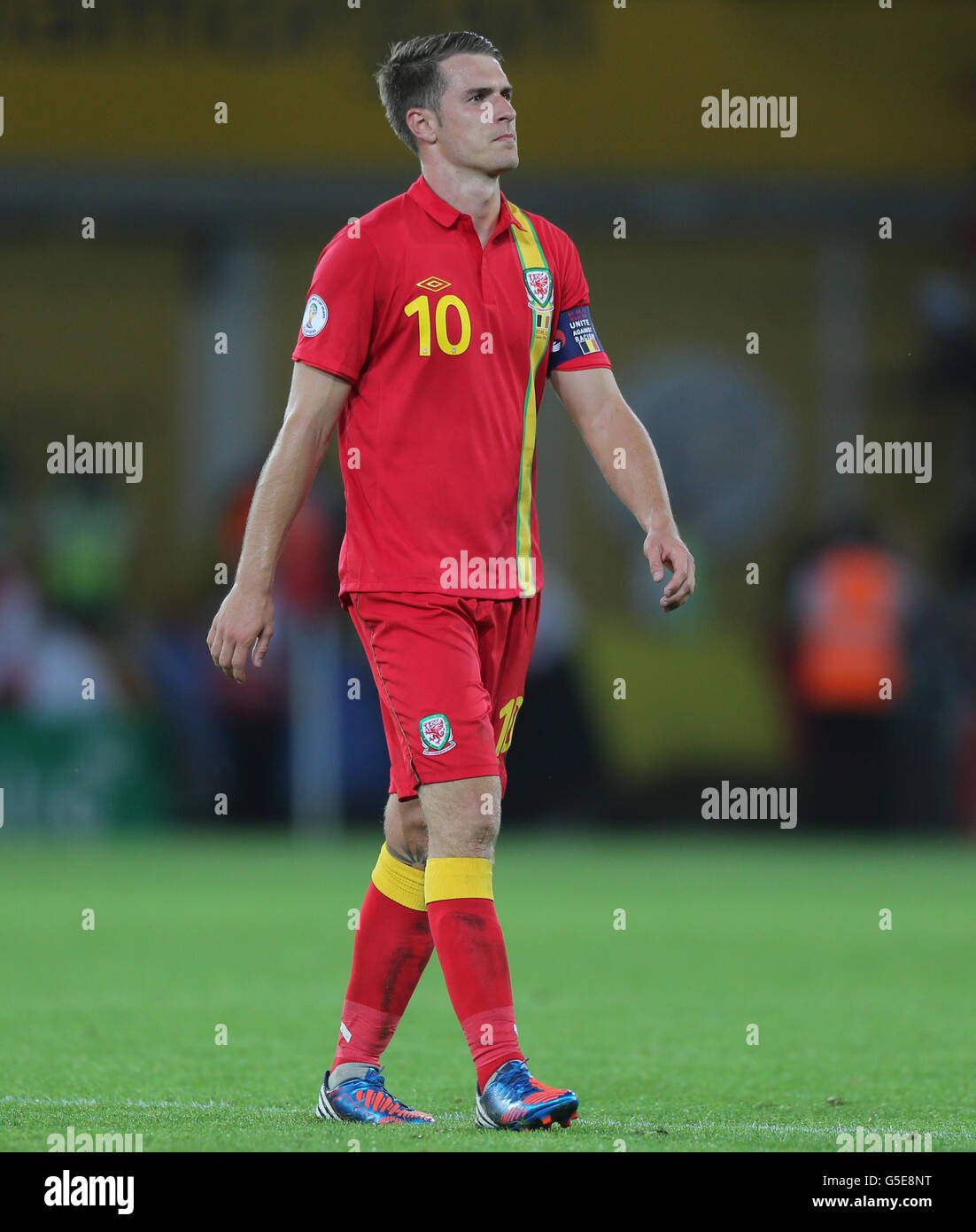 Wales captain Aaron Ramsey shows his dejection after 2-0 home defeat against Belgium during the 2014 Fifa World Cup Qualifying match at the Cardiff City Stadium, Cardiff. Stock Photo
