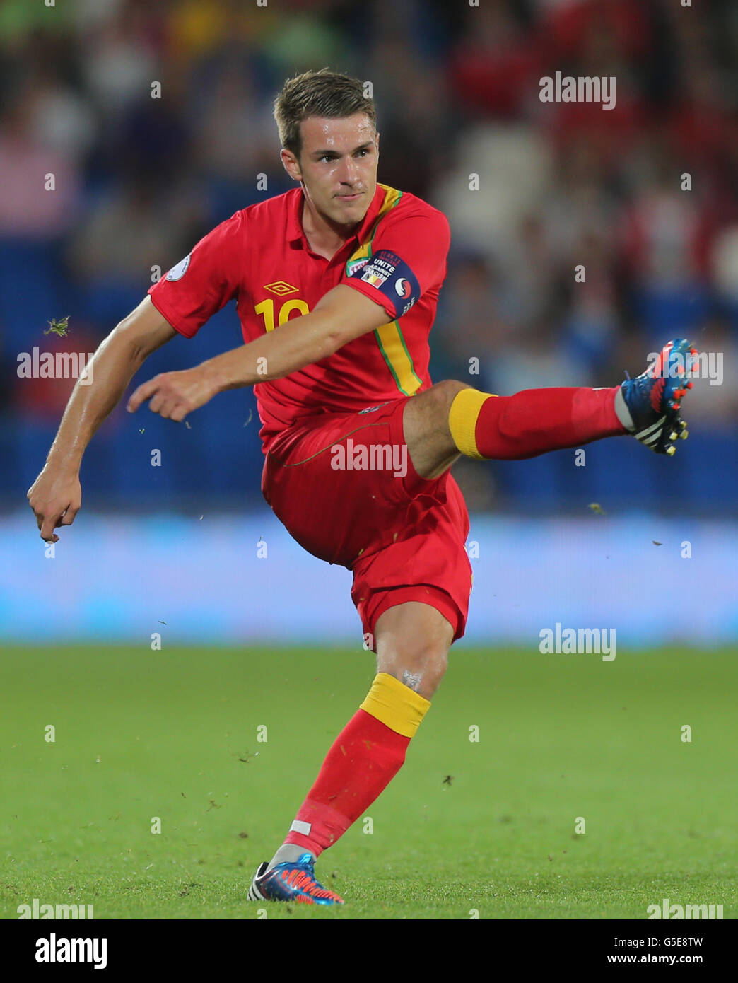 Wales captain Aaron Ramsey during the 2014 Fifa World Cup Qualifying match at the Cardiff City Stadium, Cardiff. Stock Photo