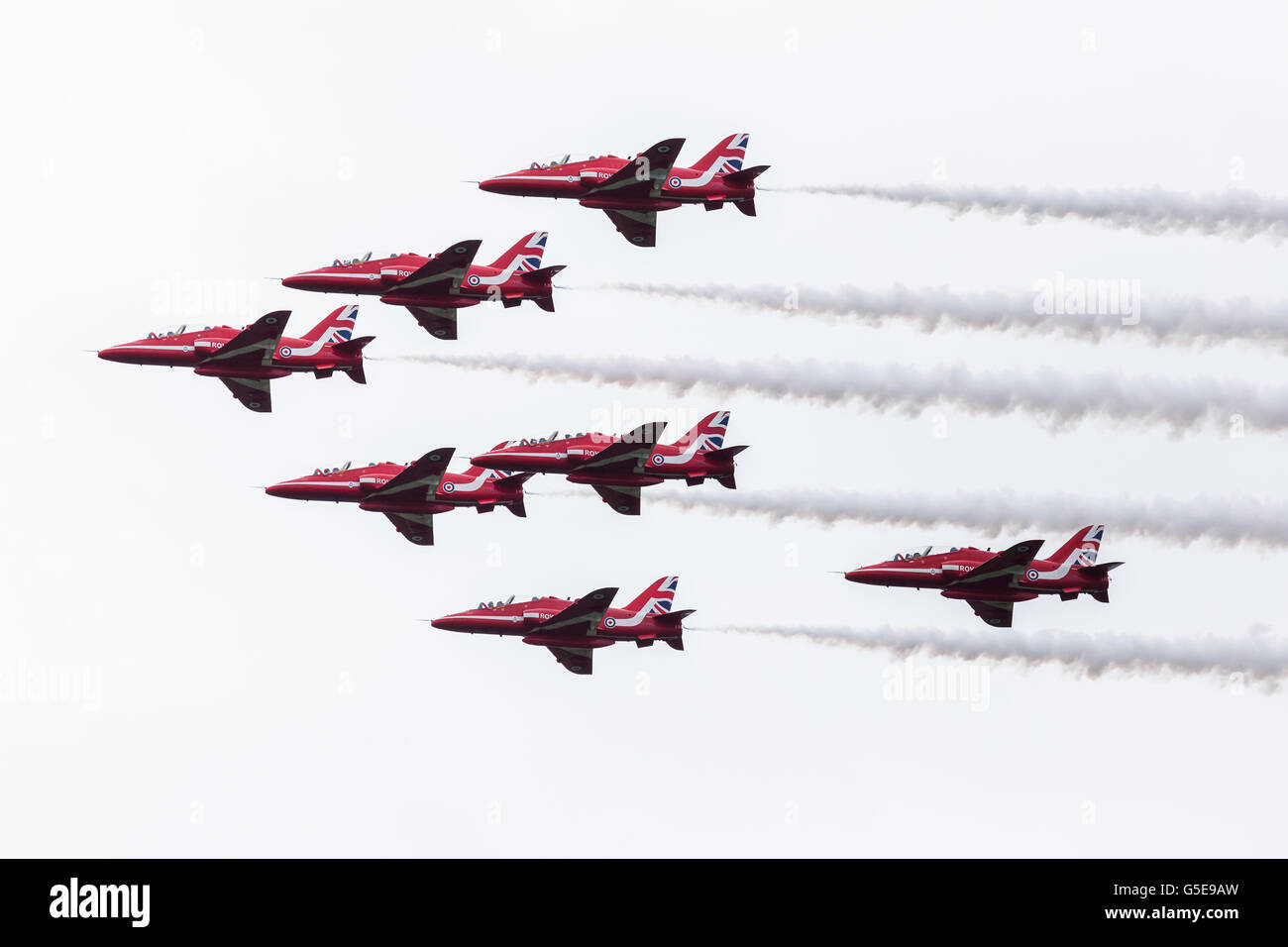 Red Arrows seven-ship during the rollback manoeuvre Stock Photo