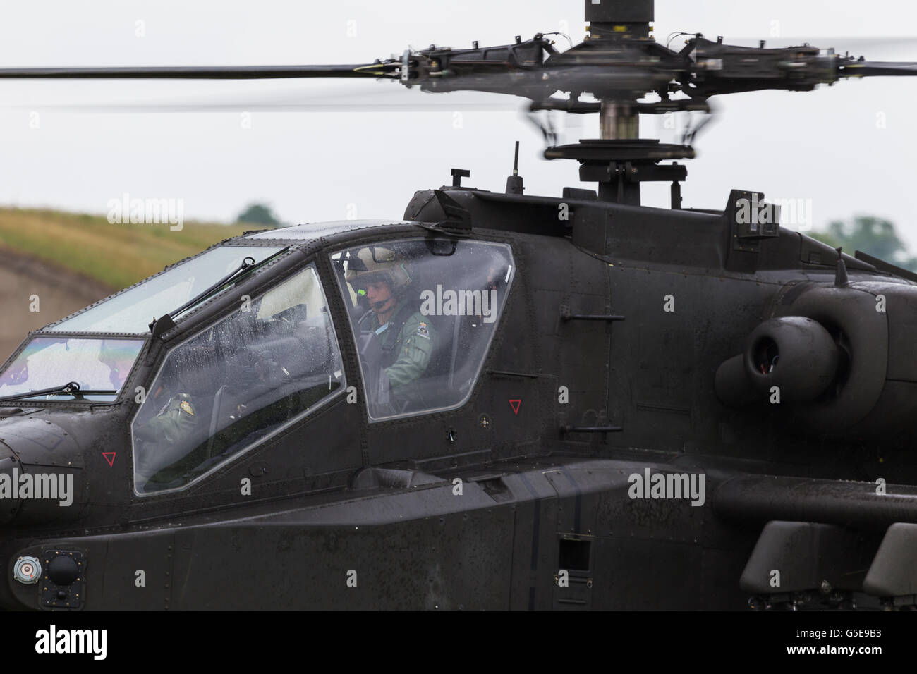 Apache crew in the cockpit before takeoff Stock Photo