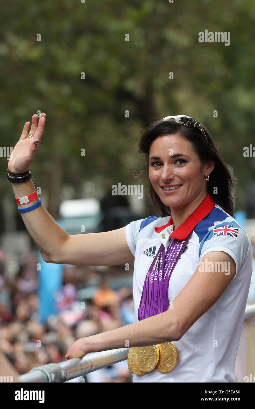 British Paralympic gold medal winning cyclist Sarah Storey waves to the crowd during the London