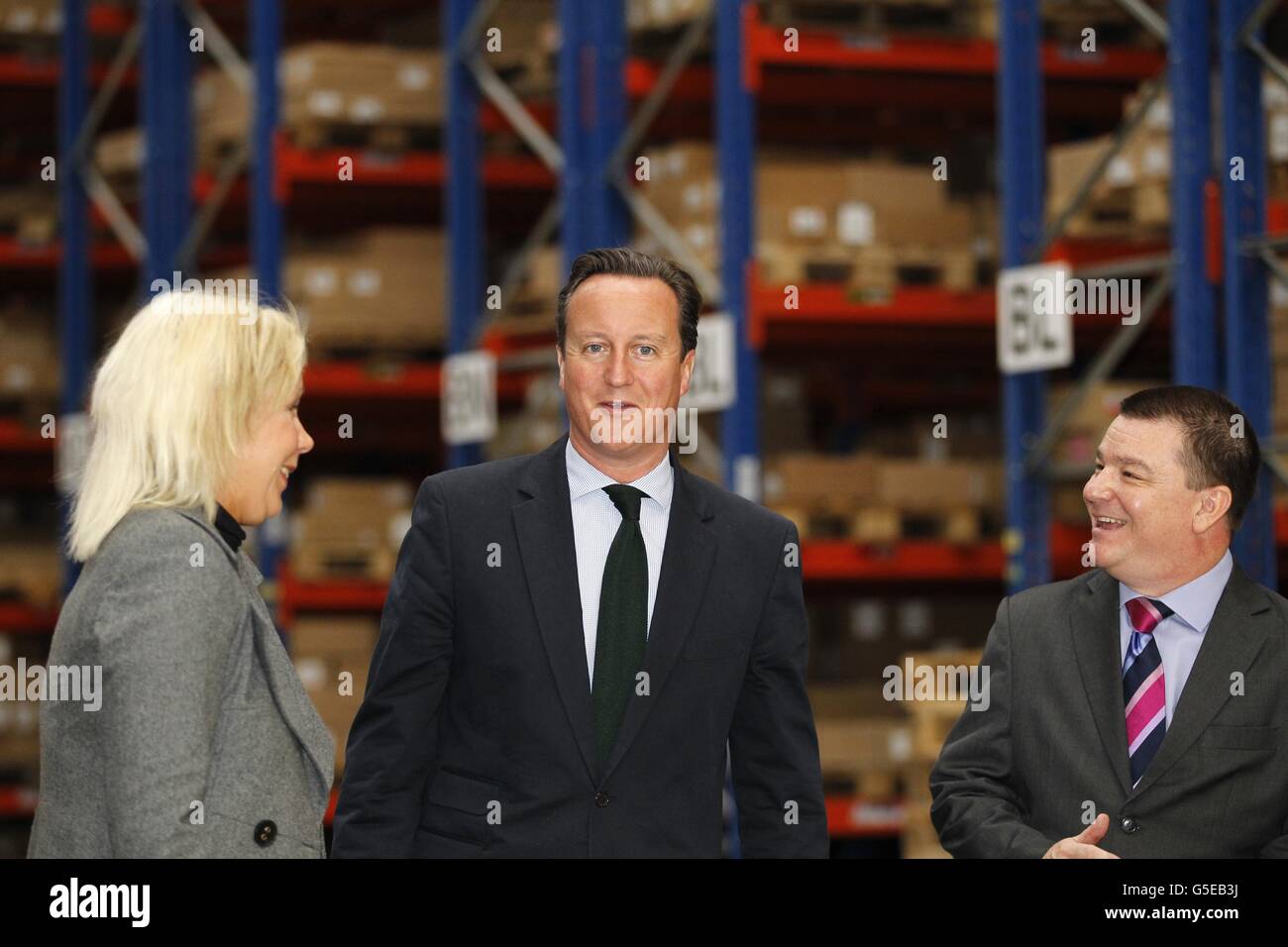 Prime Minister David Cameron is shown round the Sony Digital Audio Disc