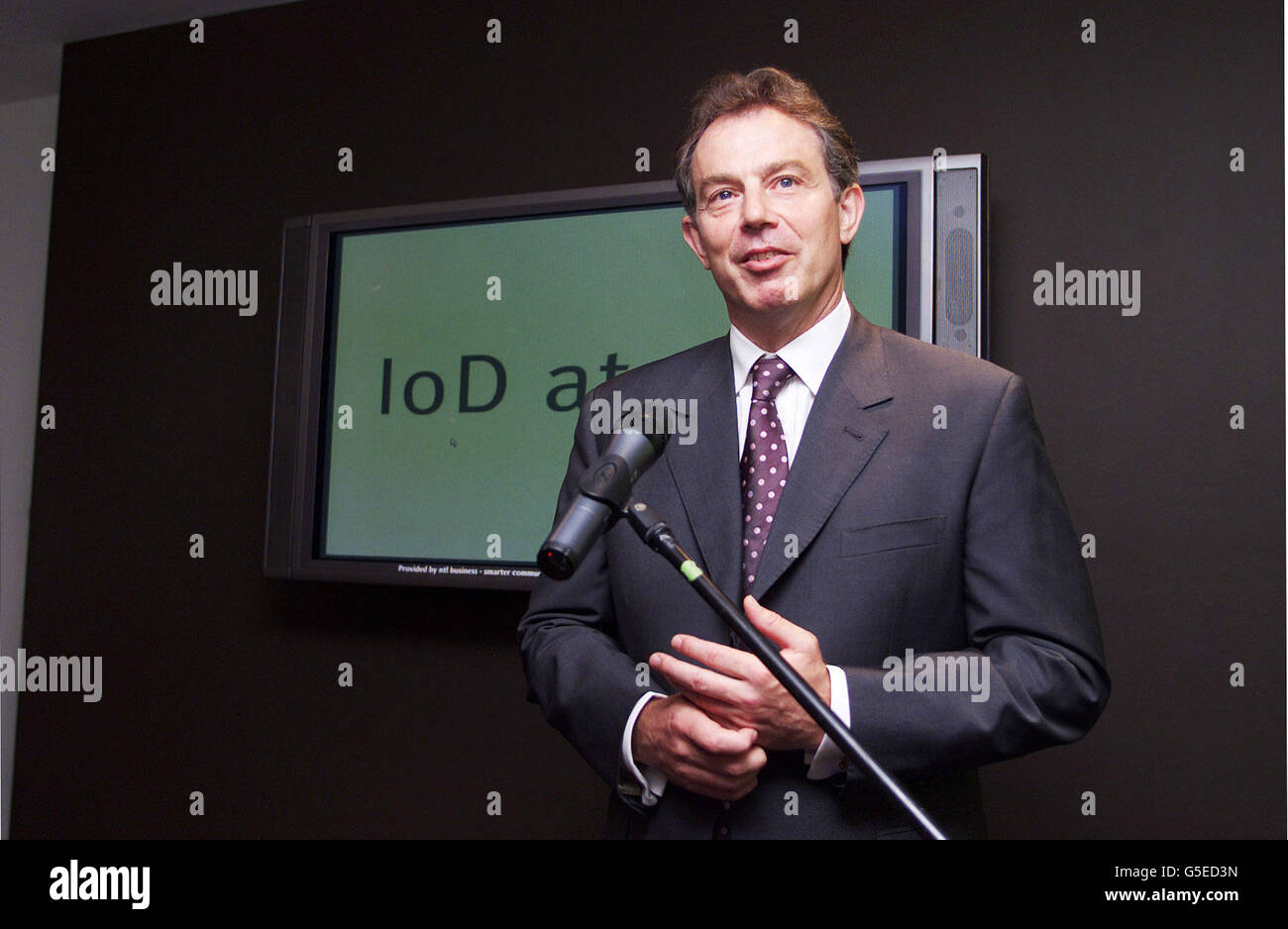 Prime Minister Tony Blair addresses members as he opens the Institute of Directors Building (IoD) centre at Pall Mall, central London. Stock Photo