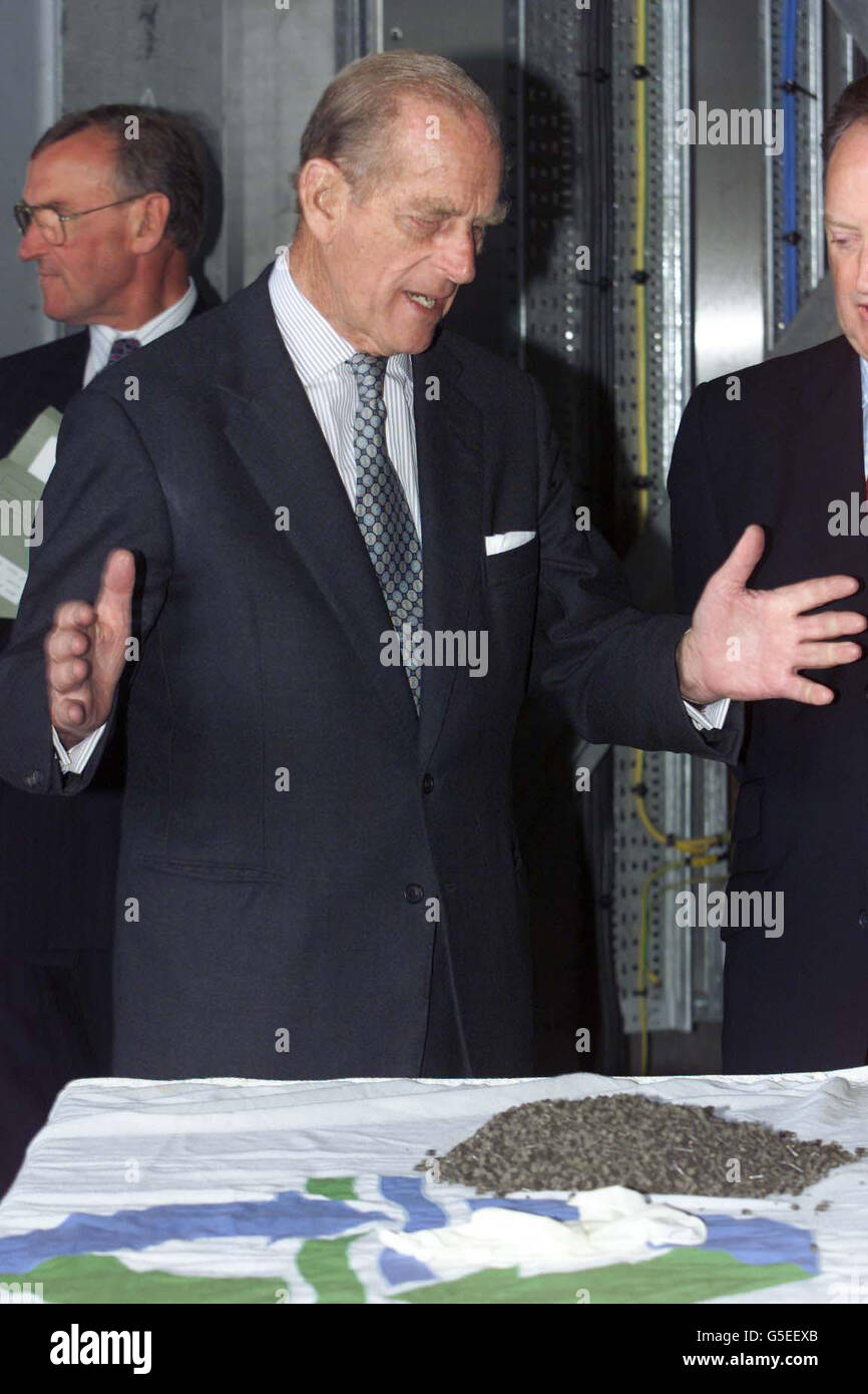 The Duke Of Edinburgh examines some sludge bio pellets at the award-winning Bran Sands Regional Sludge Treatment Centre Teesport, Teesside. * Duke officially switched on a new drying machine which processes the 1.5 million tonnes of waste created by around two million people from across the North East.The pellets can be used as a soil conditioner and Northumbrian Water hope to sign a deal with a concrete manufacturer where they will be used as arenewable energy source. Stock Photo