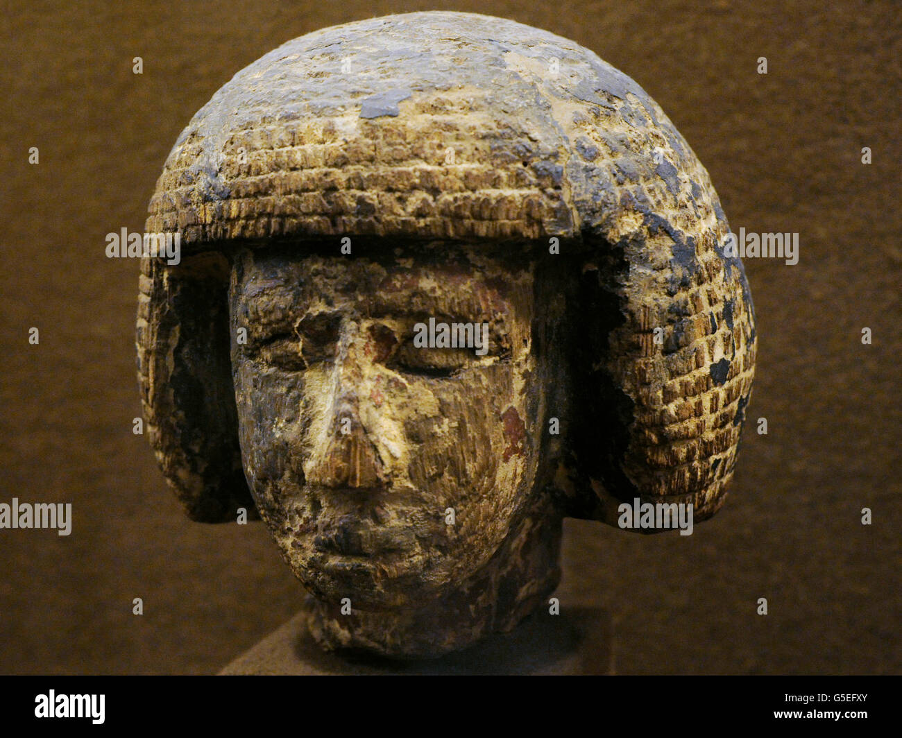 Egypt. Head man with wig. Wooden statue. Old Kingdom. The State Hermitage Museum. Saint Petersburg. Russia. Stock Photo
