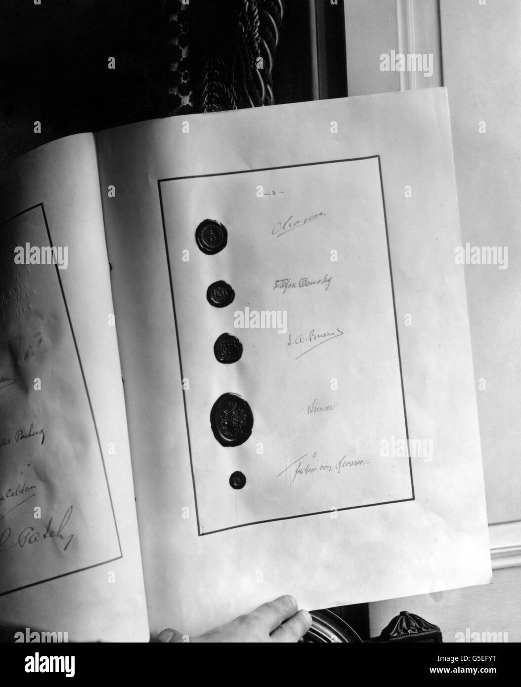 The signatures of German delegates on the peace treaty, agreeing that Germany will pay compensation for the scuttling of her fleet at Scapa Flow. Stock Photo