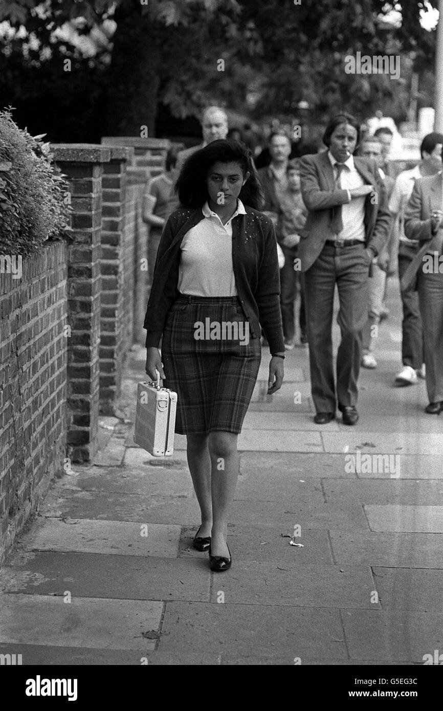 Maria Yianni, 19, who bears a strong resemblance to her 17 year old sister Yiannoulla, taking part in a police reconstruction of her younger sister's last walk. Yiannoulla was sexually assaulted and then strangled in a bedroom of her home in Belsize Road, Kilburn, after walking home from the family shoe-repair shop in nearby Belsize Circus. Stock Photo
