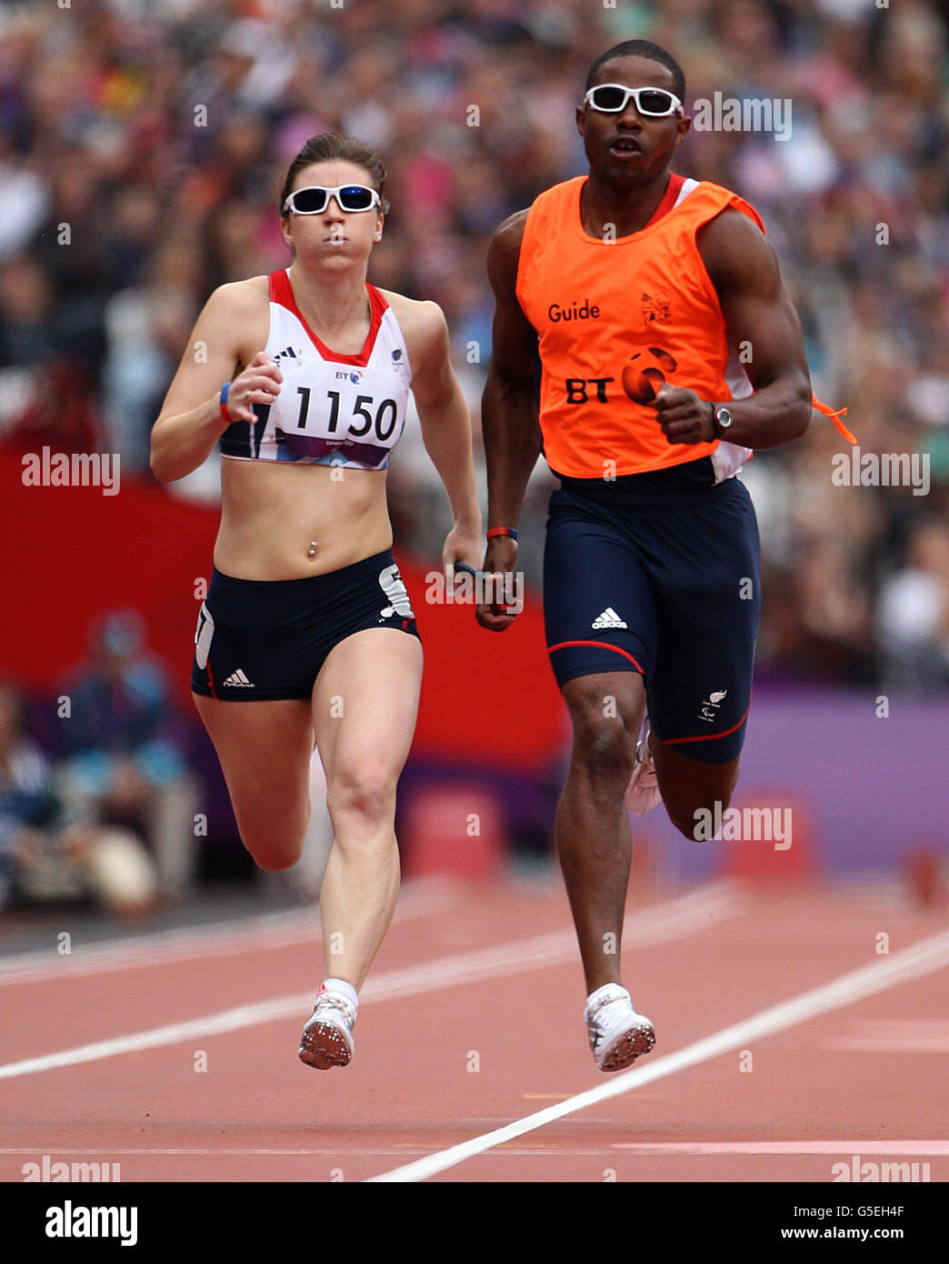 Great Britain's Libby Clegg and Mikail Huggins (guide) in action in Round 1 of the Women's 100m ...