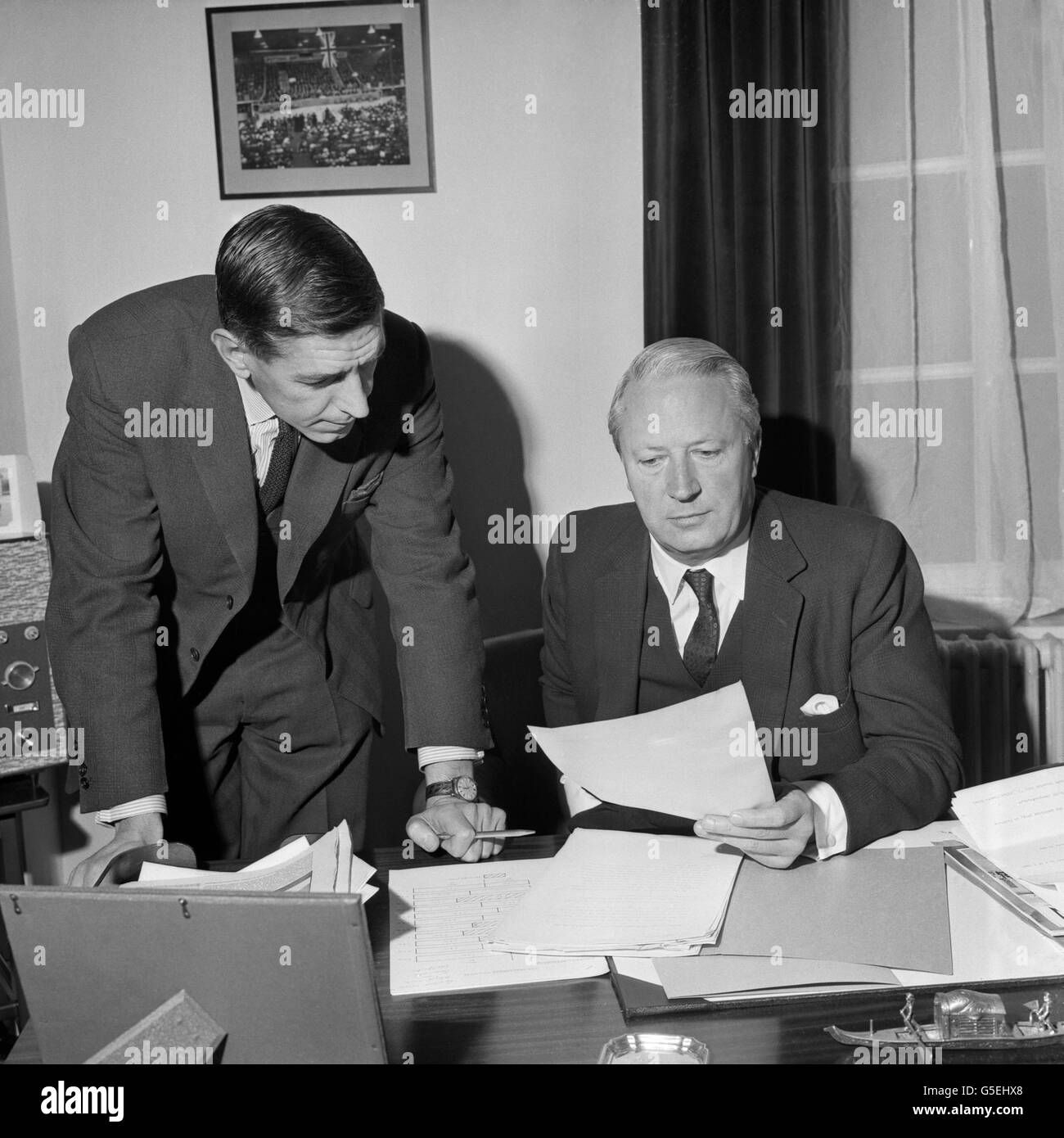 Leader of the opposition, (Conservative), Edward Heath (r) and Tory Party Chairman Edward Du Cann (l) checking over papers together at the Conservative Party Central Office, Smith Square, London, after he had been announced that there would be a General Election on March 31st of that year. Stock Photo