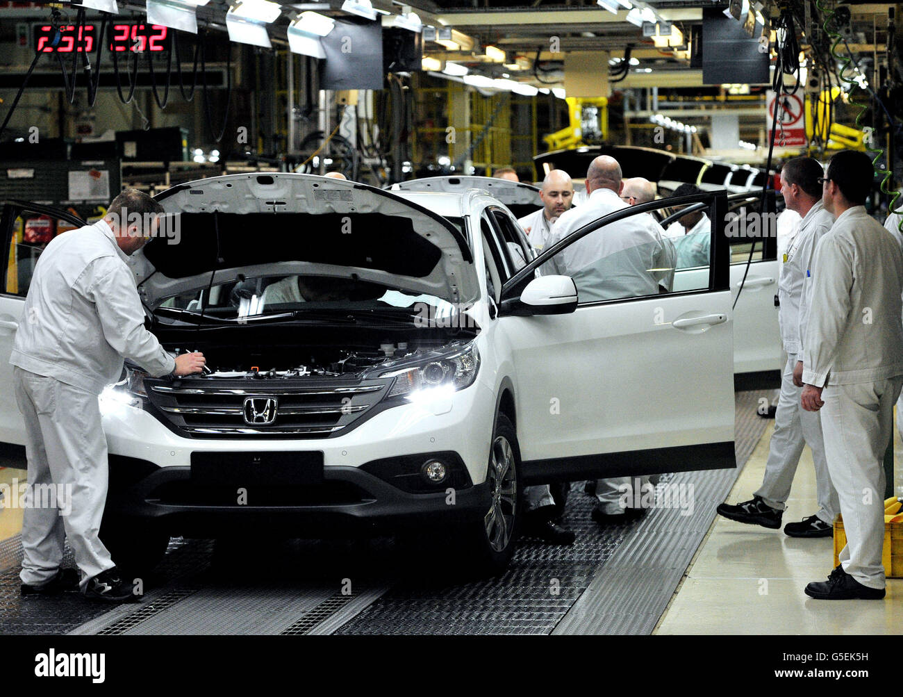 Workers on the Honda CR-V production line at the Honda Plant in Swindon, as Honda has announced a £267 million investment programme at this plant, with hundreds of new jobs being created. Stock Photo