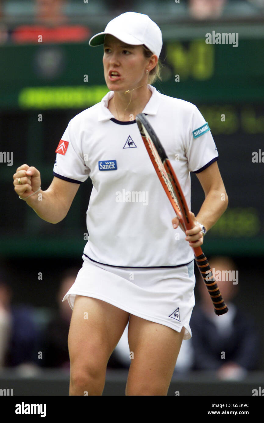 NO COMMERCIAL USE: Belgium's Justine Henind in action against Lisa Raymond of USA during their Second Round match of the 2001 Lawn Tennis Championships at Wimbledon, London. Stock Photo