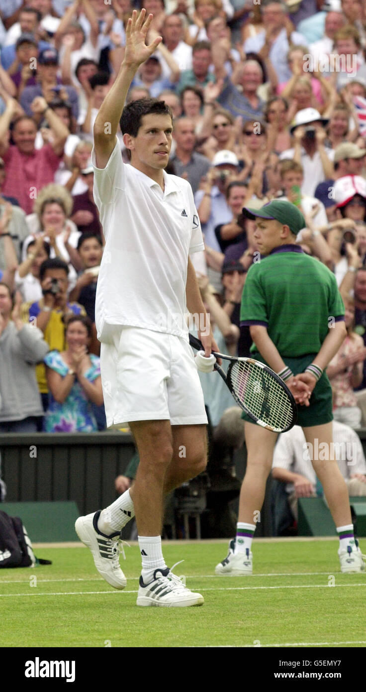 Great Britain's Tim Henman celebrates beating Switzerland's Rogere ...