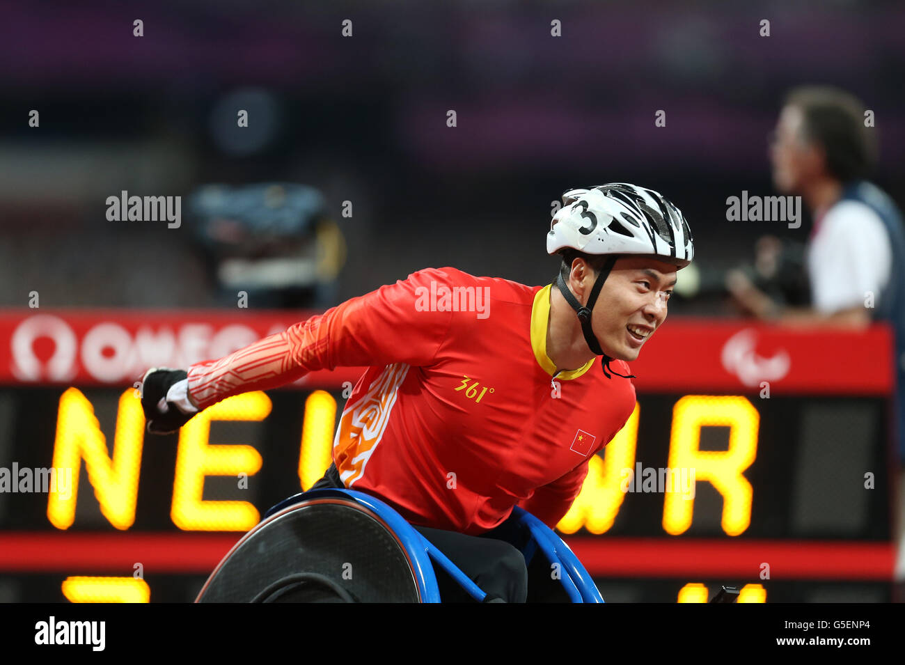 China's Lixin Zhang crosses the line to win Gold in the Men's 4 x 400m ...
