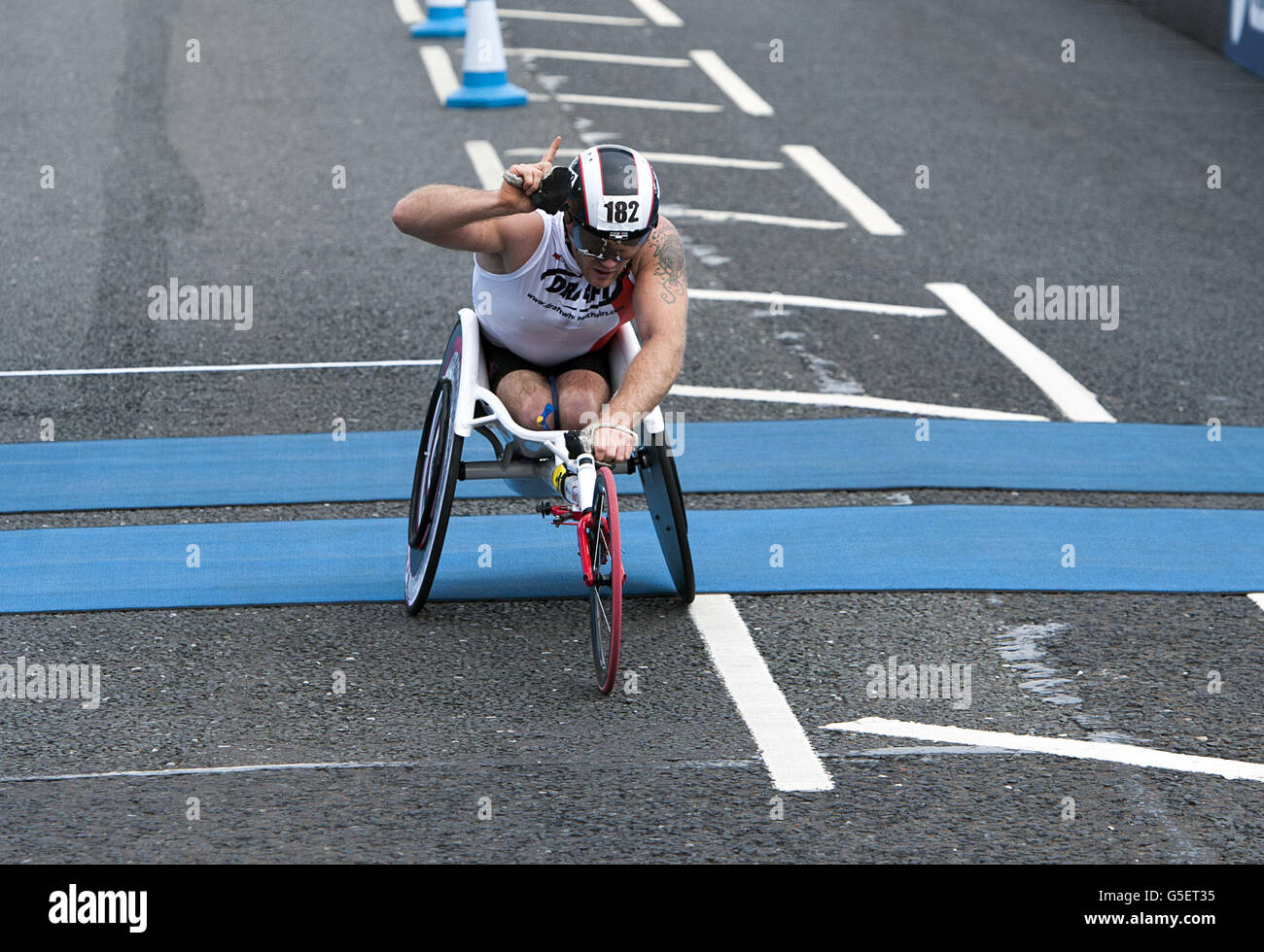 Josh Cassidy celebrates winning the Wheelchair 2012 Bupa Great North Run in Newcastle Stock